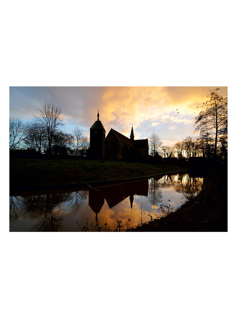 Bildmotiv eines Art Prints der Heimatlinse mit von Kirchen-Silhouetten bei Abendstimmung.